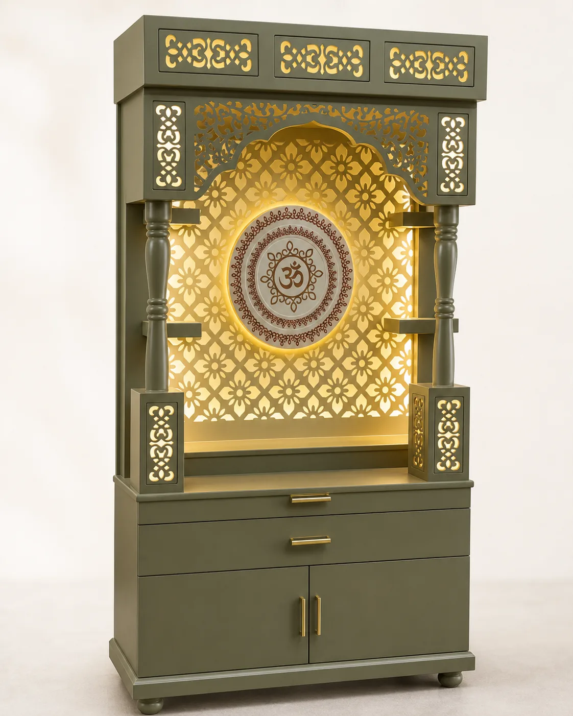 Olive green mandir unit with gold jaali panels and a backlit Om medallion.