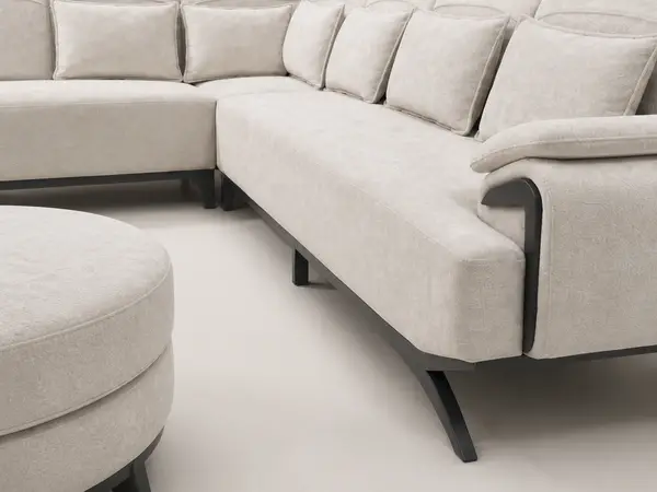 Close-up of vertical channel tufting on cream sectional