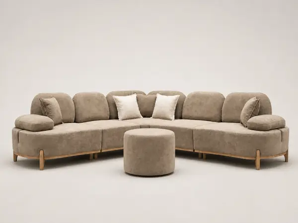 Beige curved sectional with round ottoman, front view