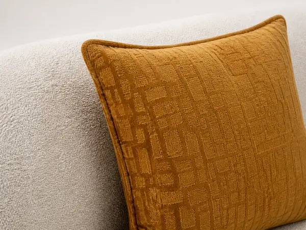 Off-white boucle curved sectional – close-up fabric detail