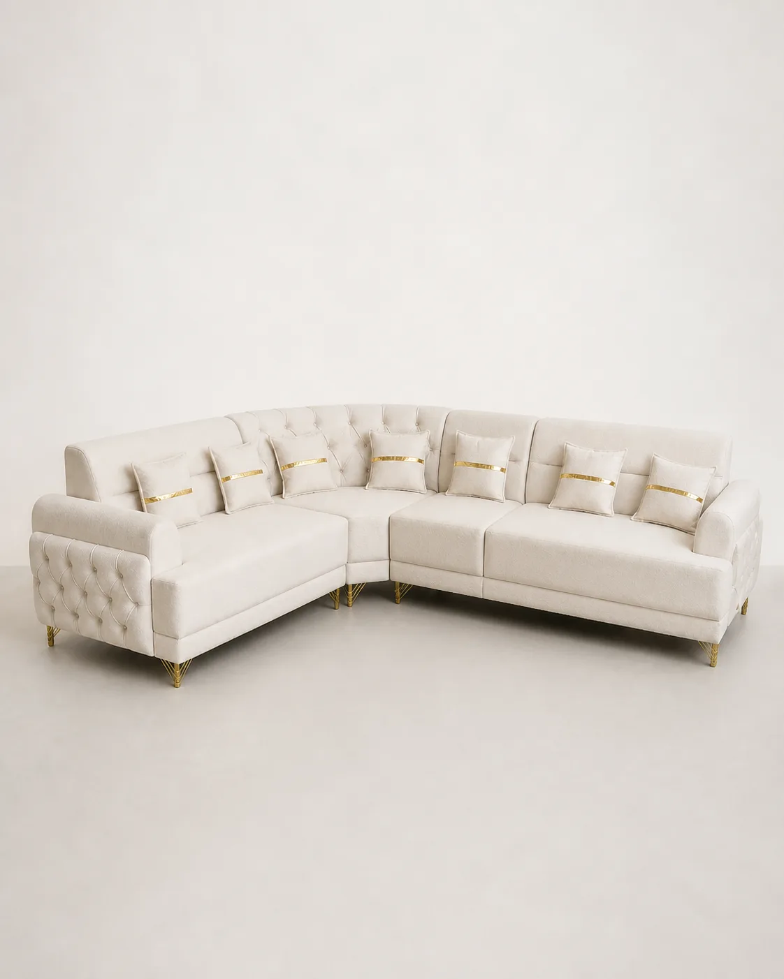 Off-white boucle L-shaped sofa set with diamond-tufted arms and gold legs.