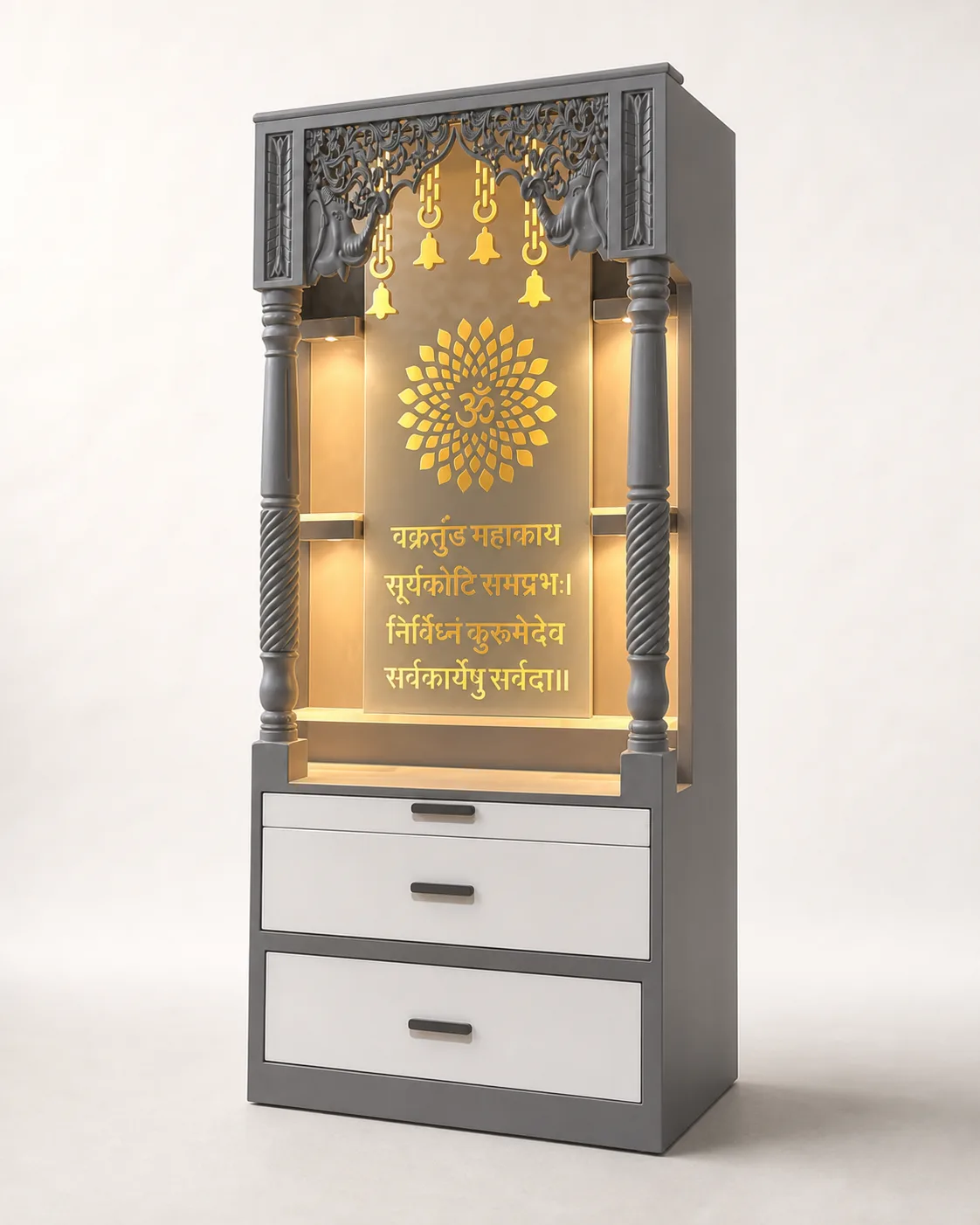 Grey framed mandir unit with carved pillars, gold lotus Om medallion and backlit Vakratunda mantra panel.