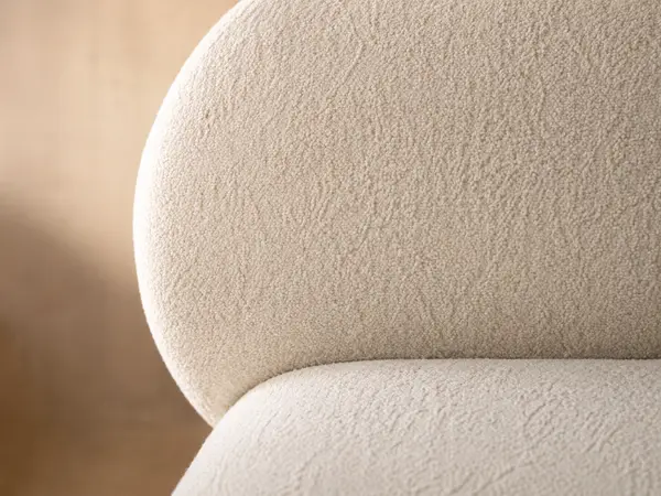 Ivory Boucle Bed with Oval Headboard — upholstery detail